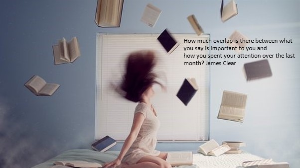 Female on bed with books flying around_how much overlap is there between what you say is important to you and what you spent your time dong over the past month.jpg